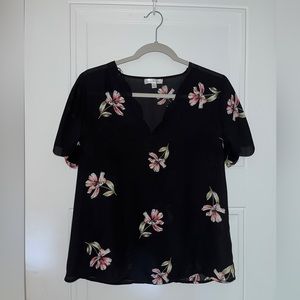 Flowy business blouse. A little see through.